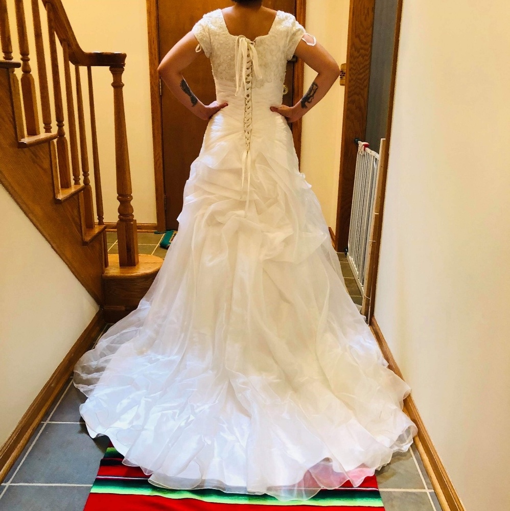 Lauren james bridal gown with matching veil